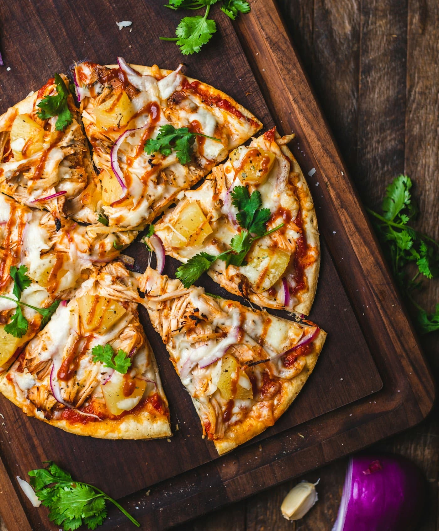 A pizza cut and ready for a pickup order